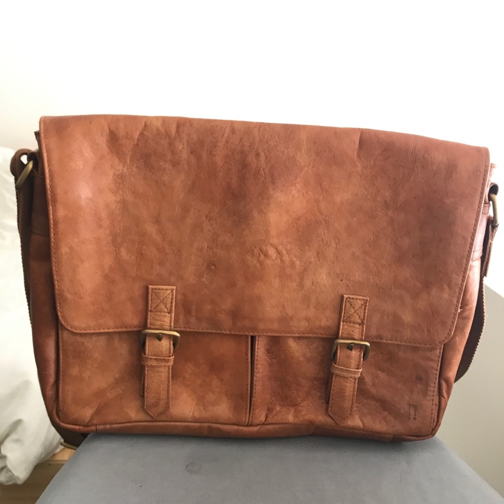 Weathered leather messenger bag